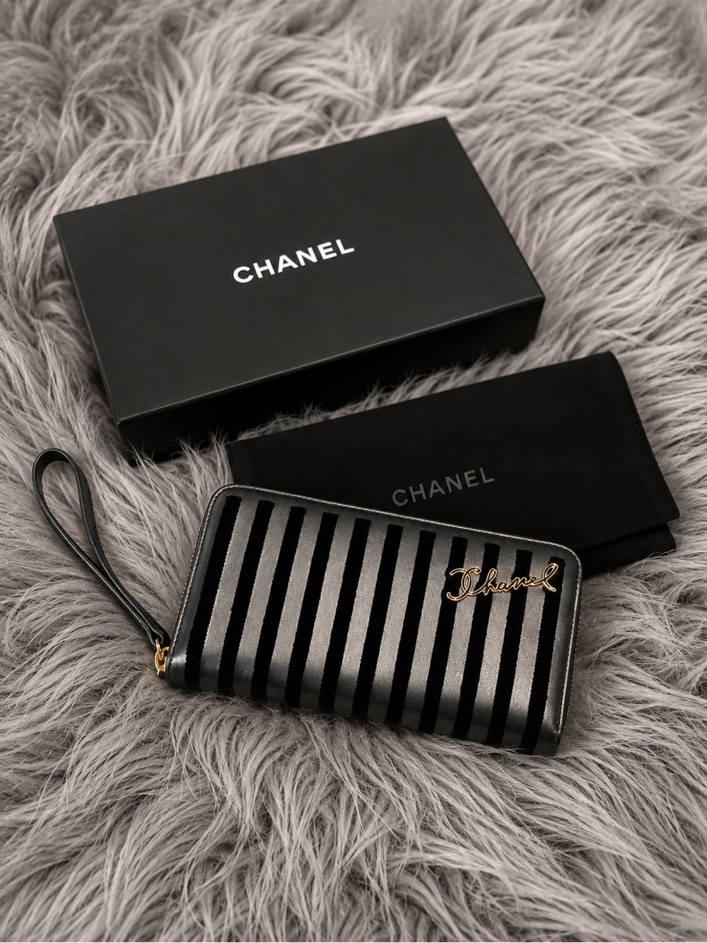 NEW! CHANEL Black and Gold Striped Wristlet